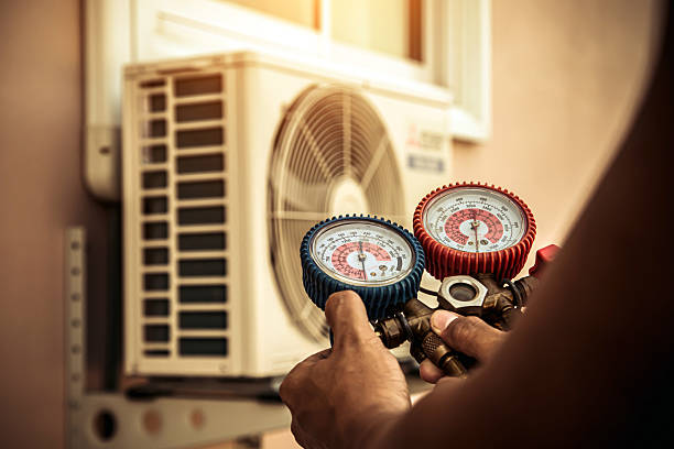 Professional Hvac technician working in Collins, MS
